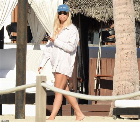 TOWIE's Chloe Meadows flaunts her figure in a pink bikini in Mexico.